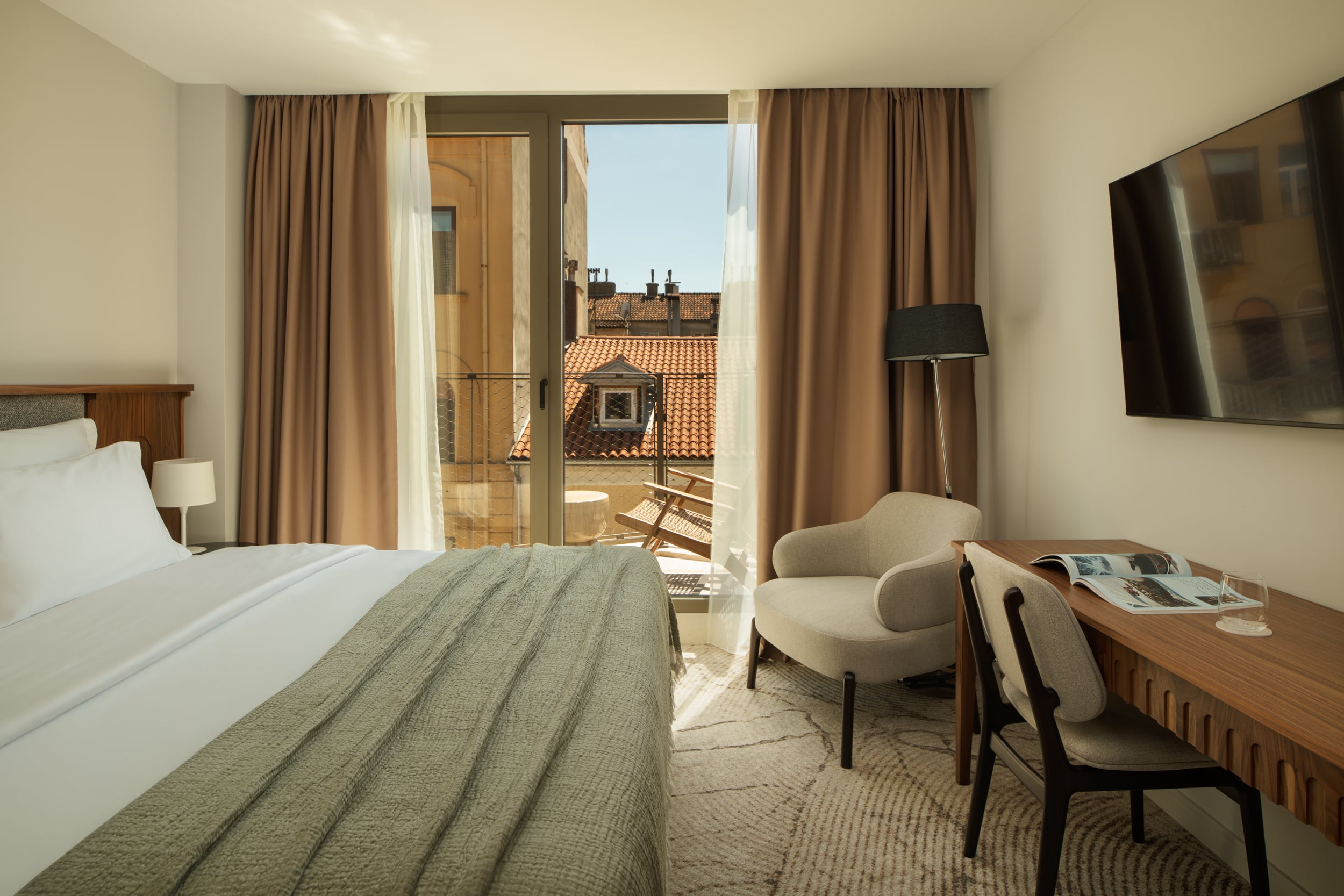 Armerun Rijeka room 404 with a private balcony.