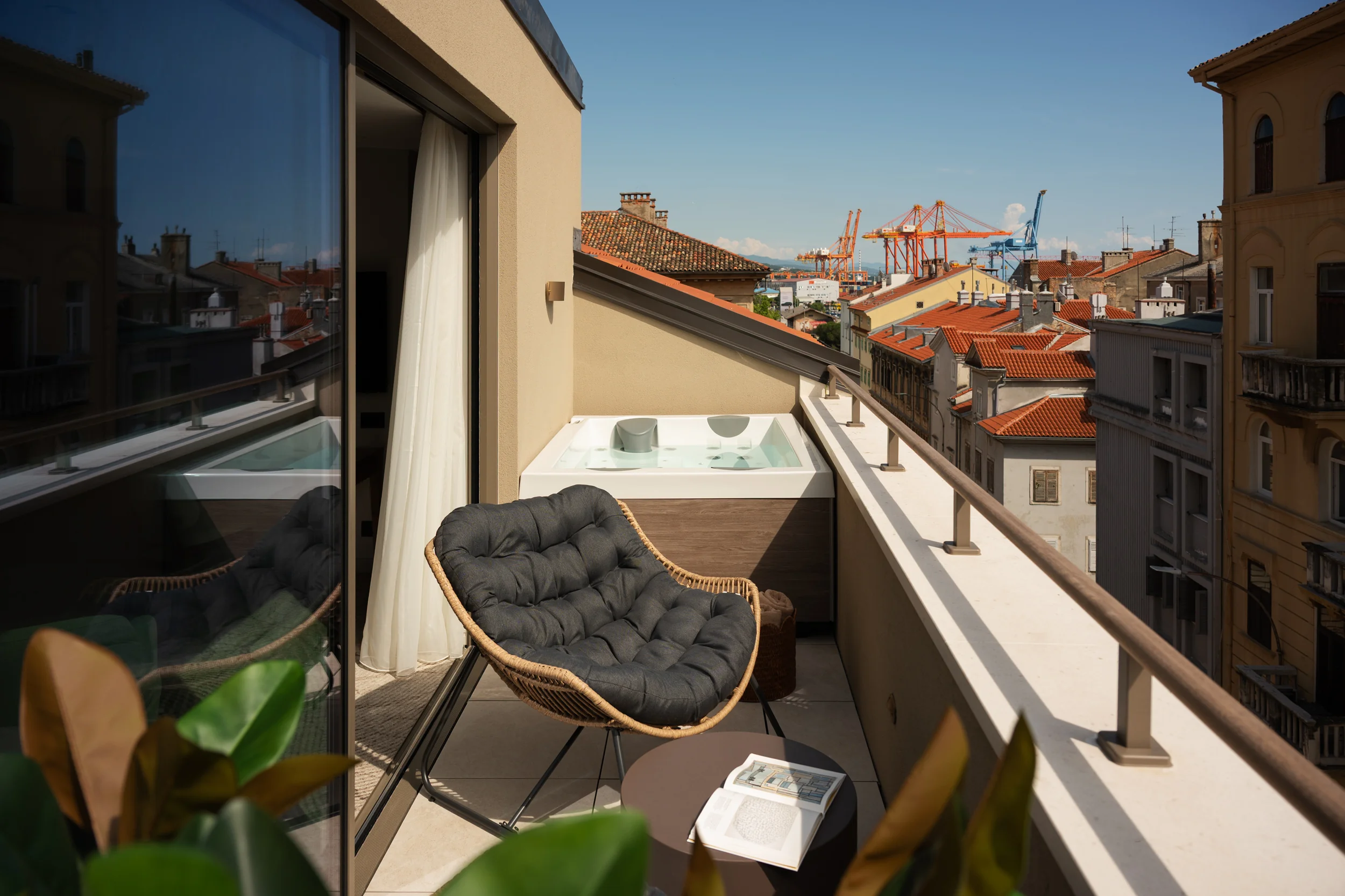Private jacuzzi terrace and city view at Armerun Rijeka room 503.