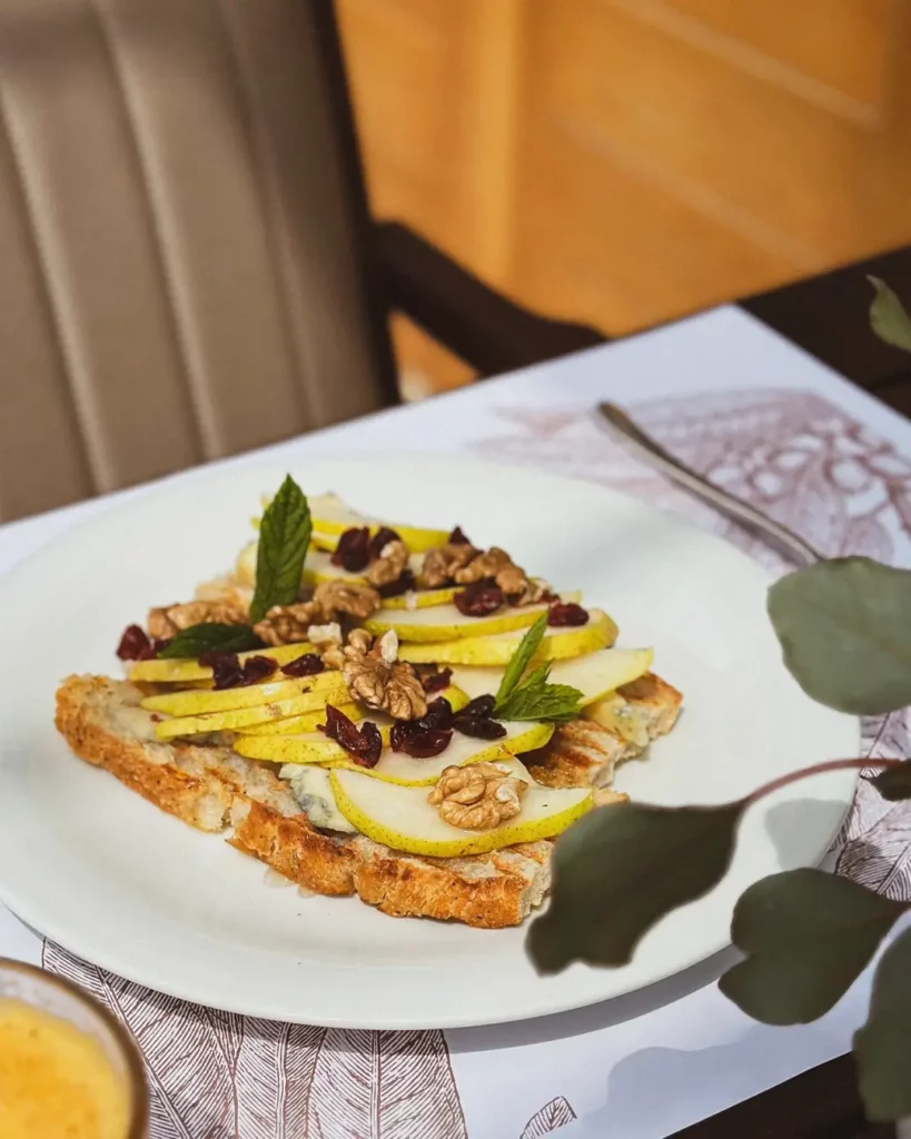 Fruit toast with walnuts served for breakfast.